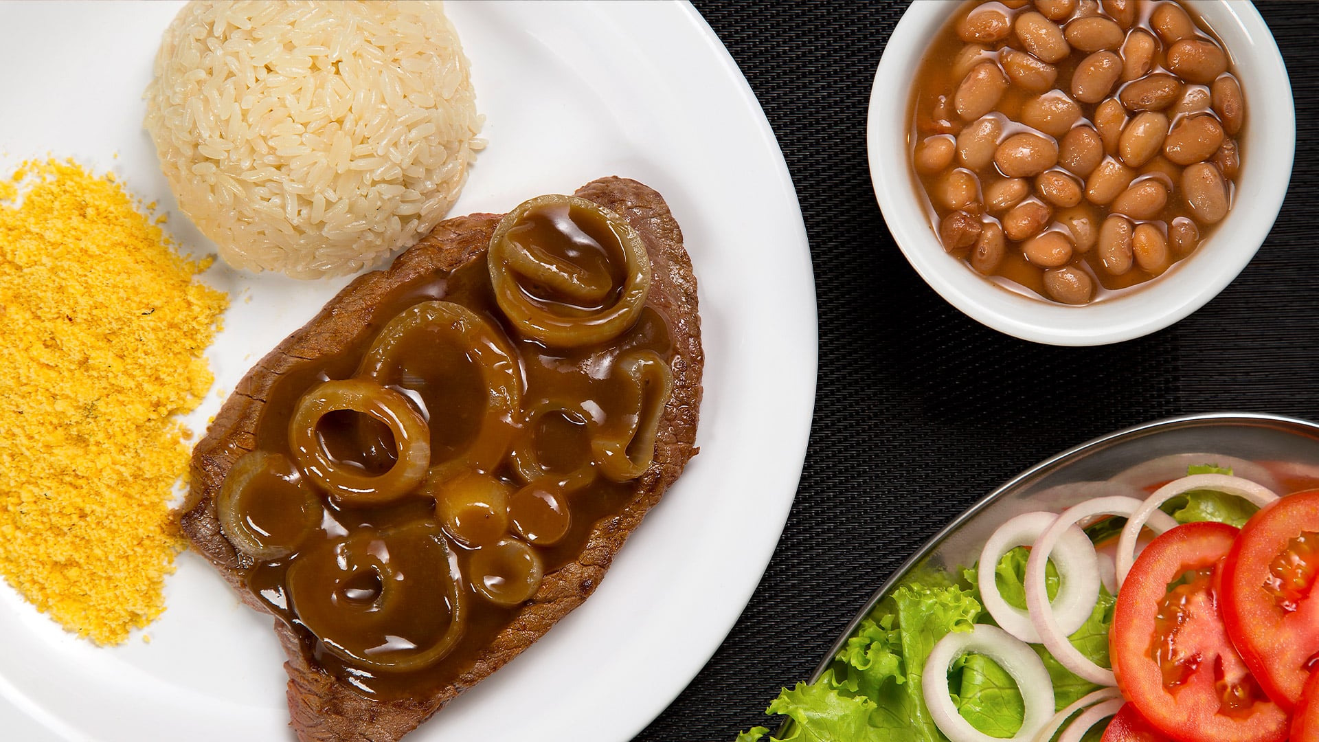 Bife acebolado