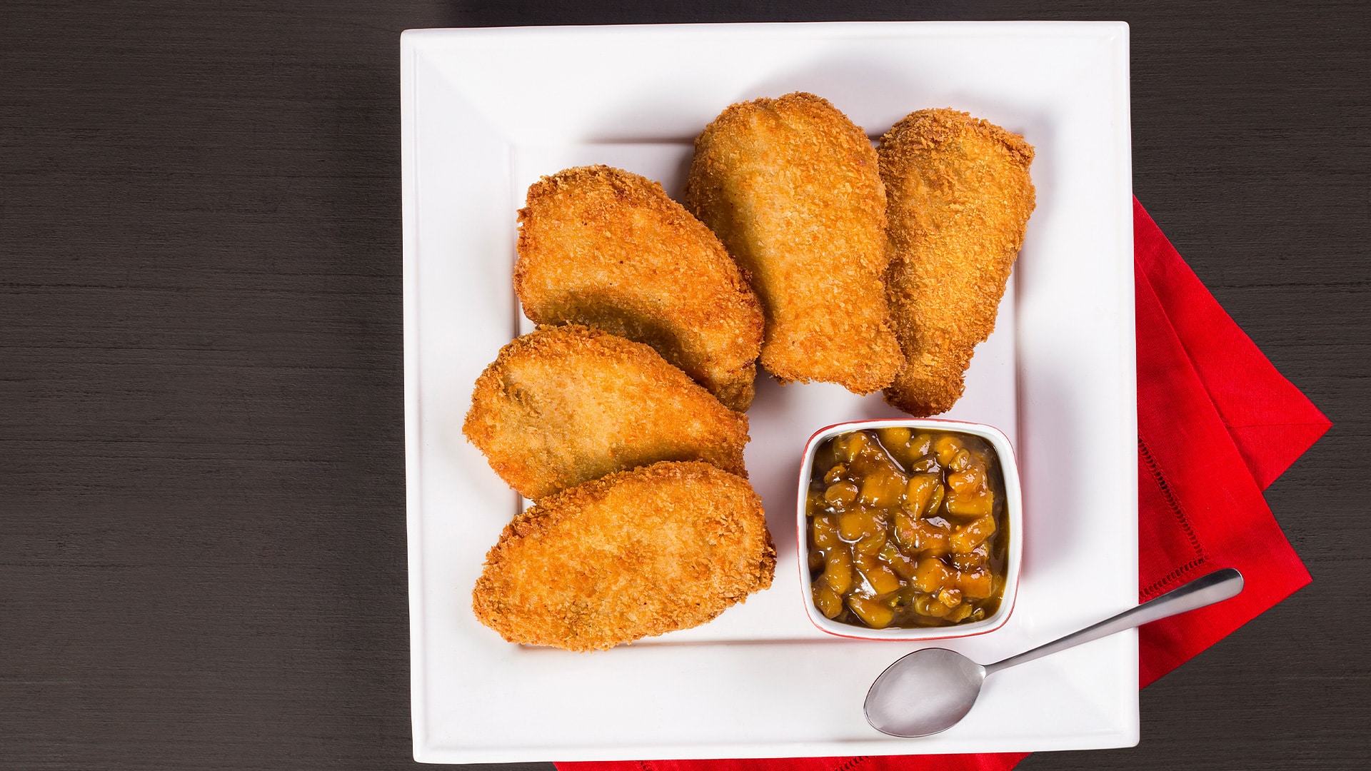 Lombo empanado com chutney de manga